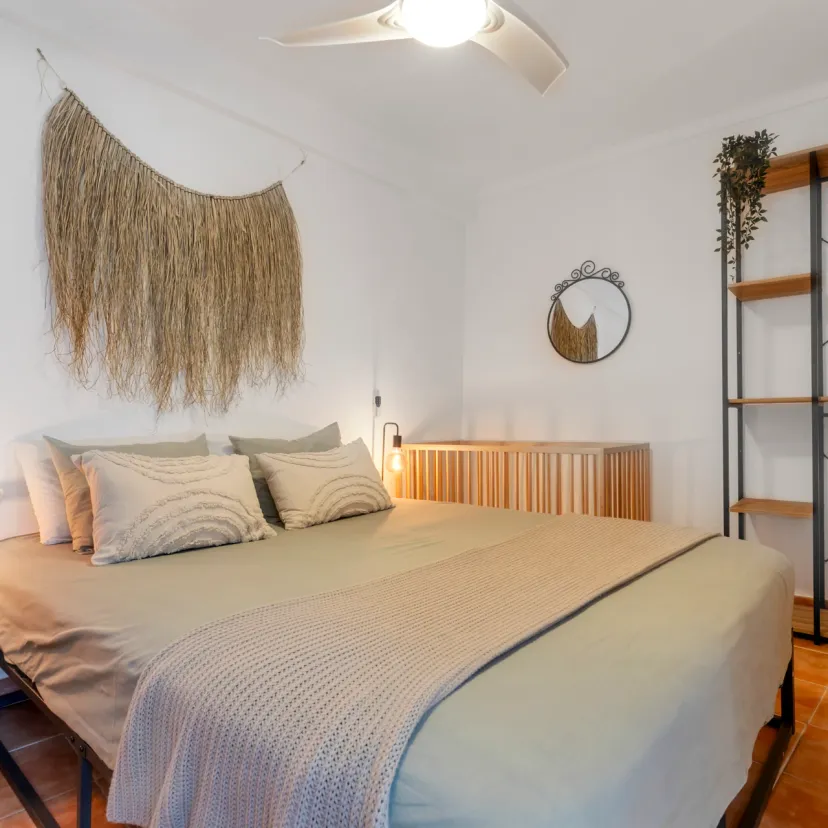 The cozy bedroom of Apartamento Olivo